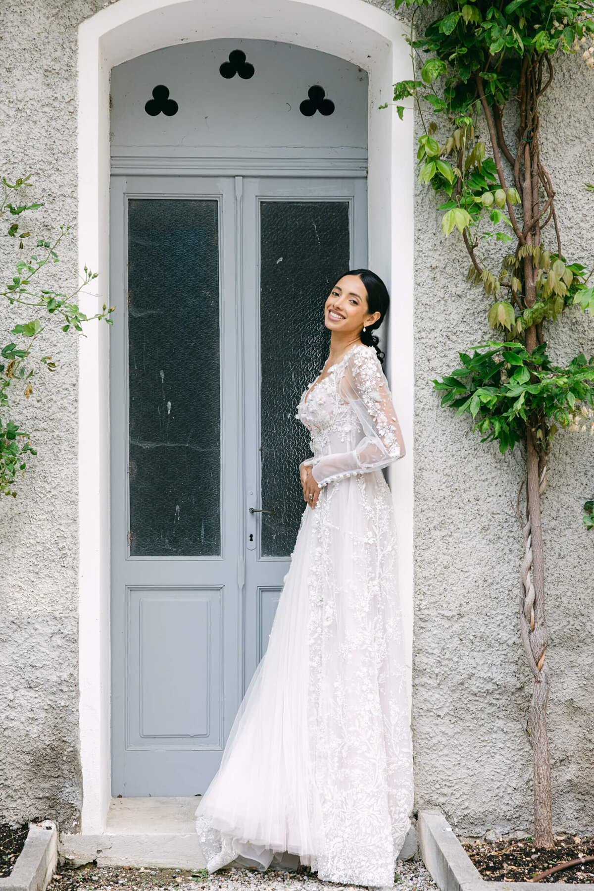 A wedding day bridal shot of a bride in her white dress at Villa Aura del Lago on lake como in Italy