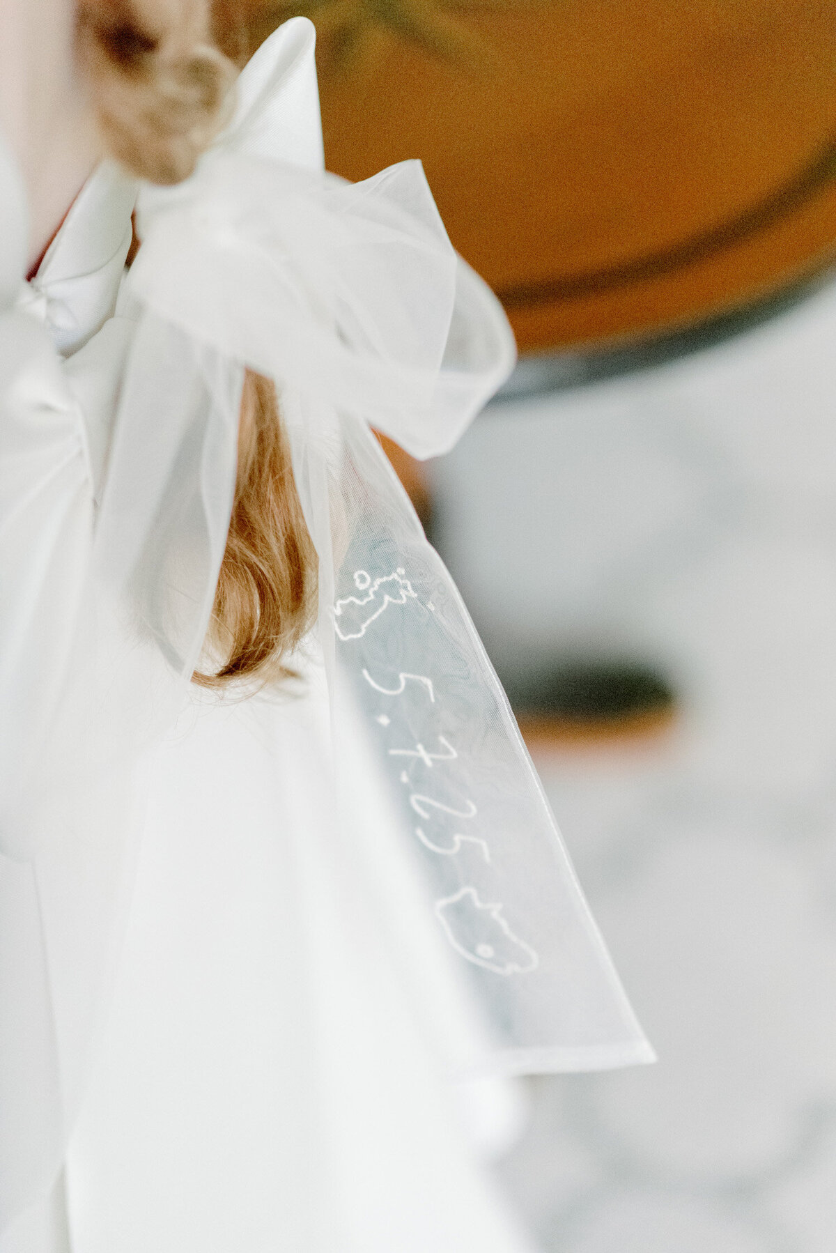 Bespoke embroidered wedding ribbon.  Image by Gleneagles wedding photographer, Jill Cherry Porter.