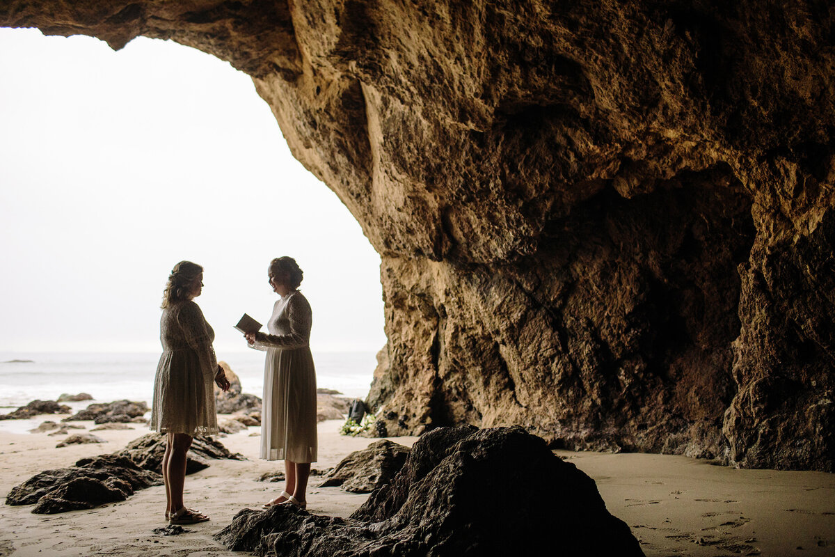 two brides exchange vows in sea caves