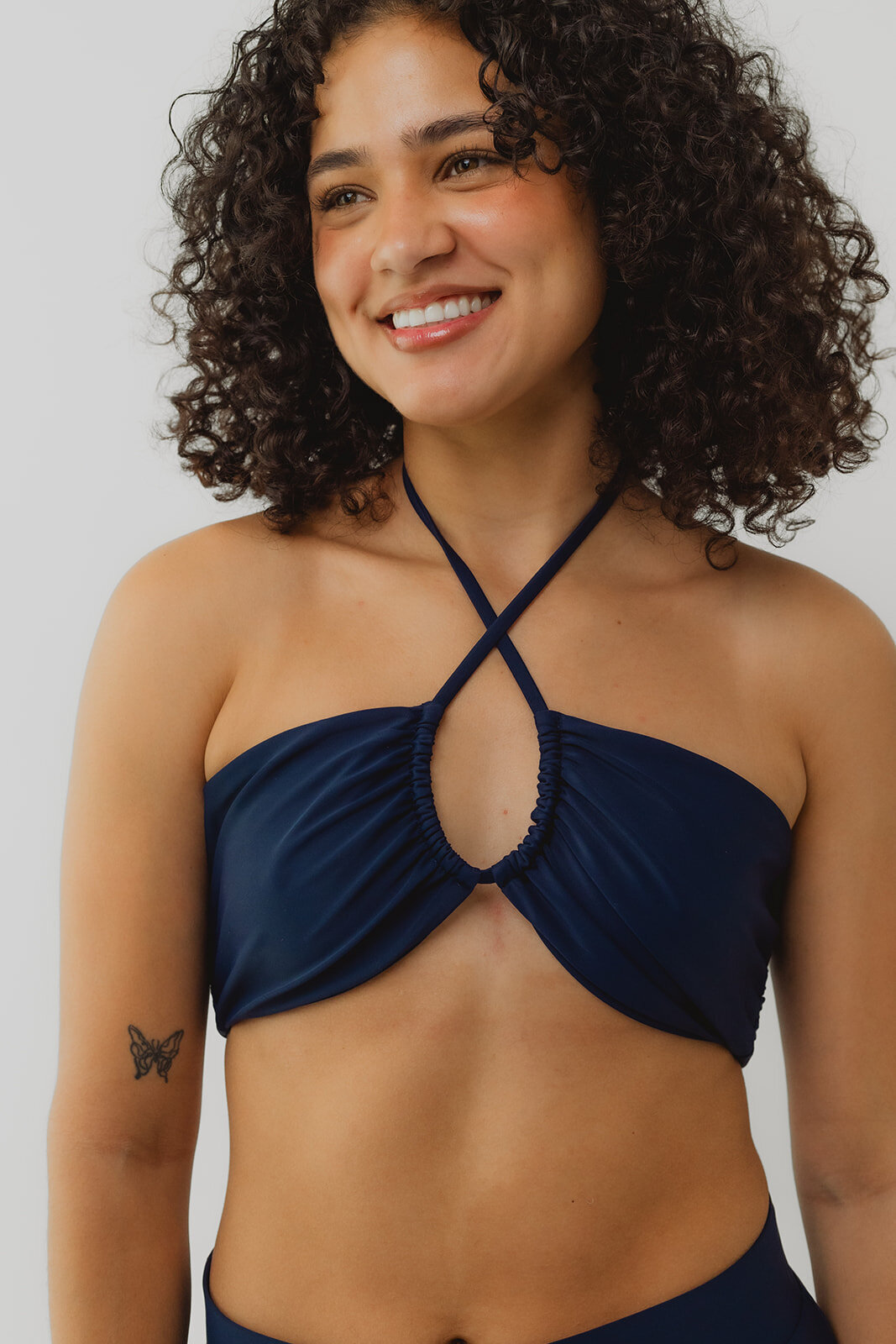 woman modeling sustainable swimwear