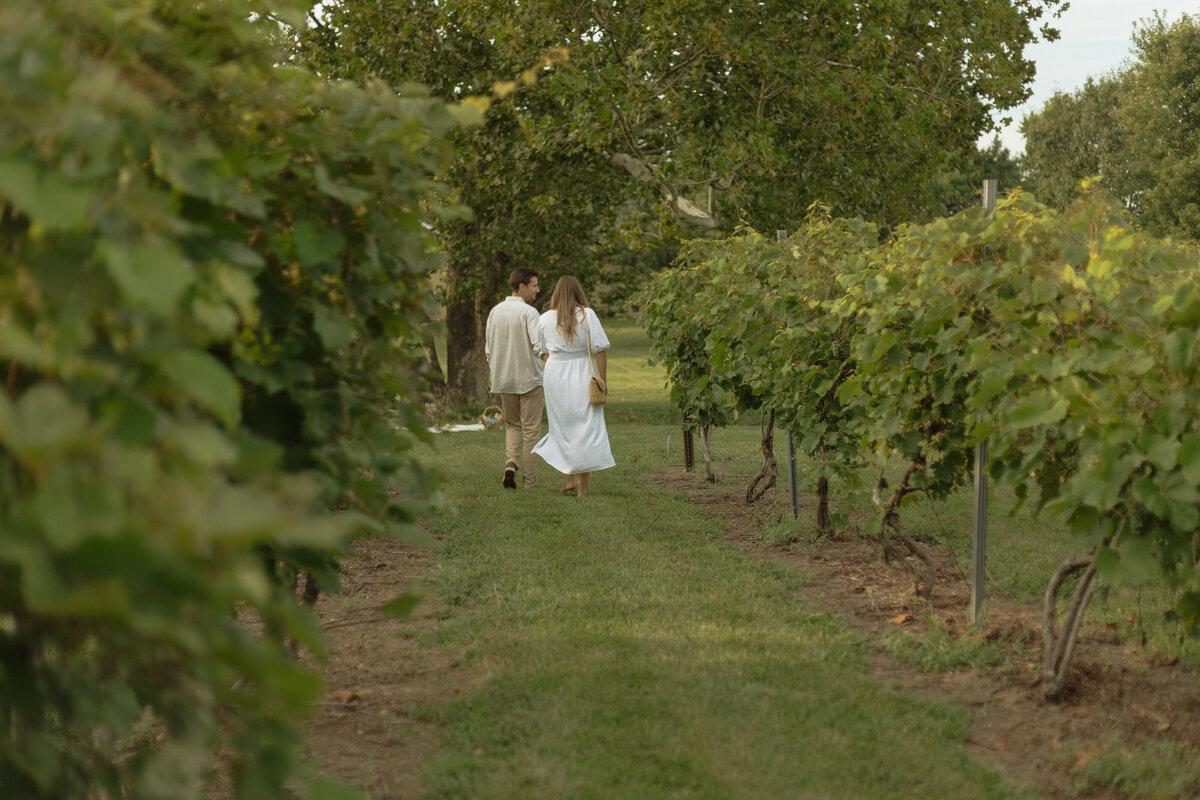 Romantic couples picnic surrounded by tropical greenery at a Florida winery