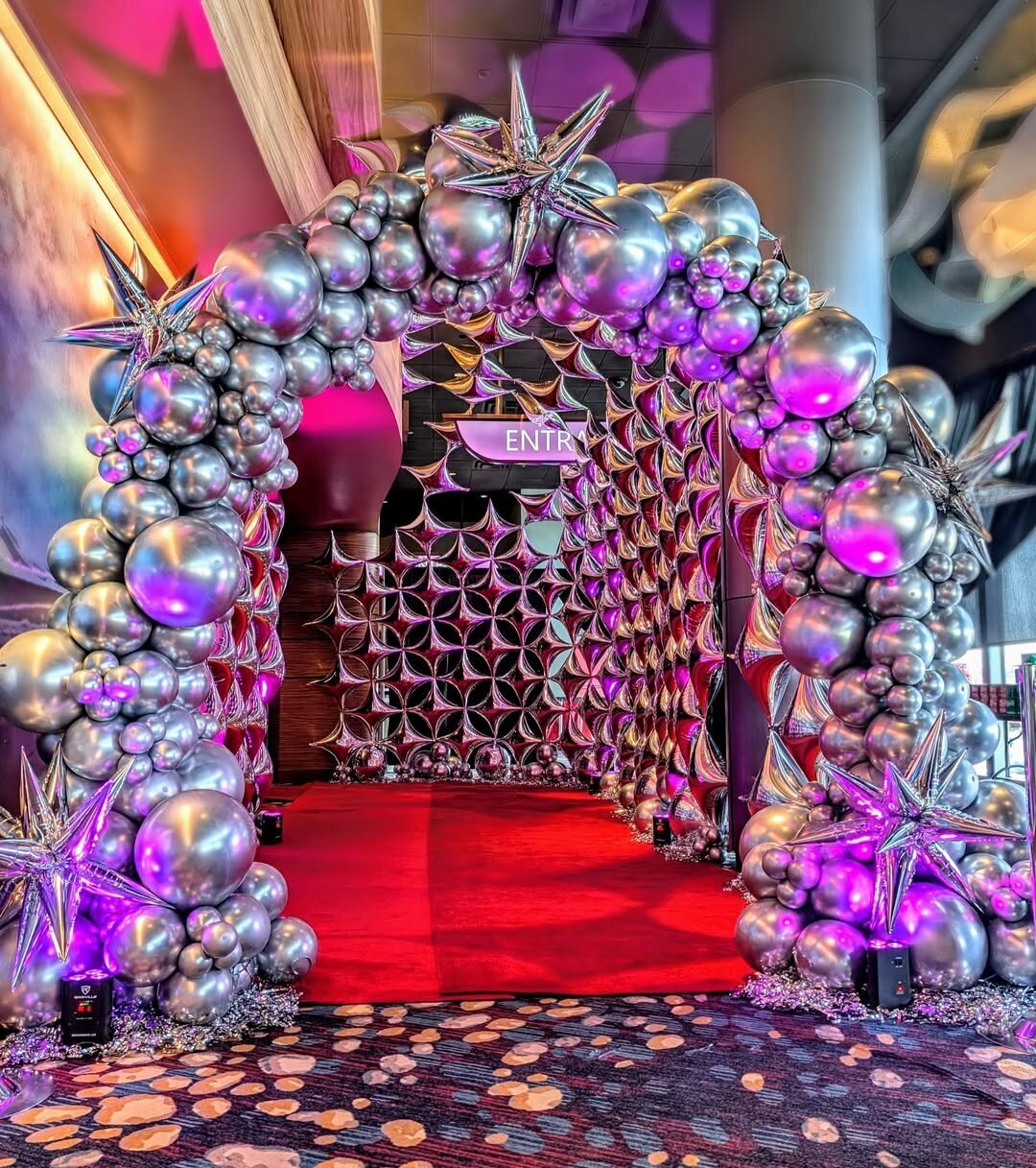 giant silver balloon arch for Seattle event or party with red carpet