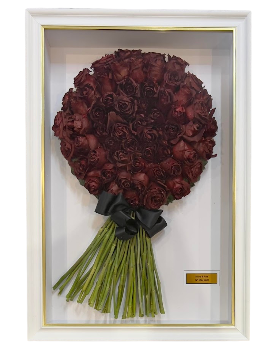 Wedding bouquet preserved in 3D frame.