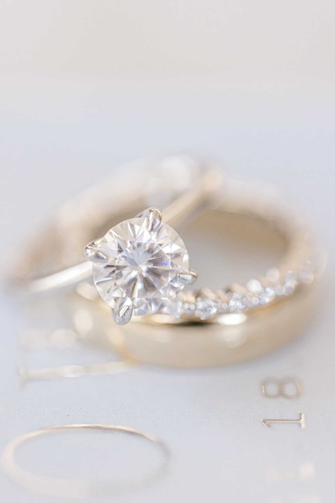 Close up of wedding rings for C&B's wedding at Christ the Kind & Capital City Club