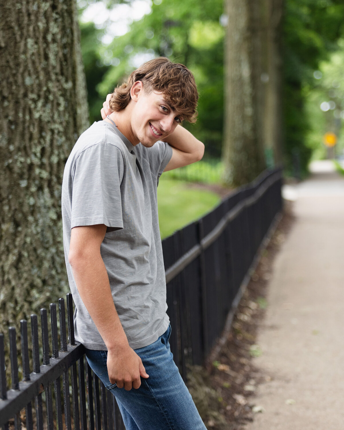 Pine Richland senior poses for his high school portraits with Melissa Helman Photography.