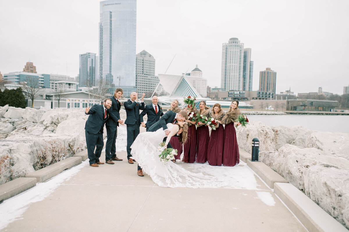 Elegant bridal party on shore of lake Michigan, Milwaukee, WI