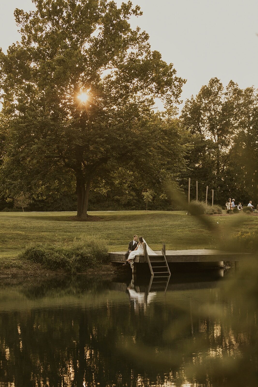bride-and-groom-pond-at-hopes-way-gathering-venue-ohio