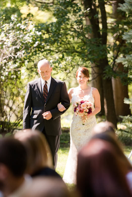 bride walking down the aisle with her dad outdoor wedding ceremony at the Hyeholde
