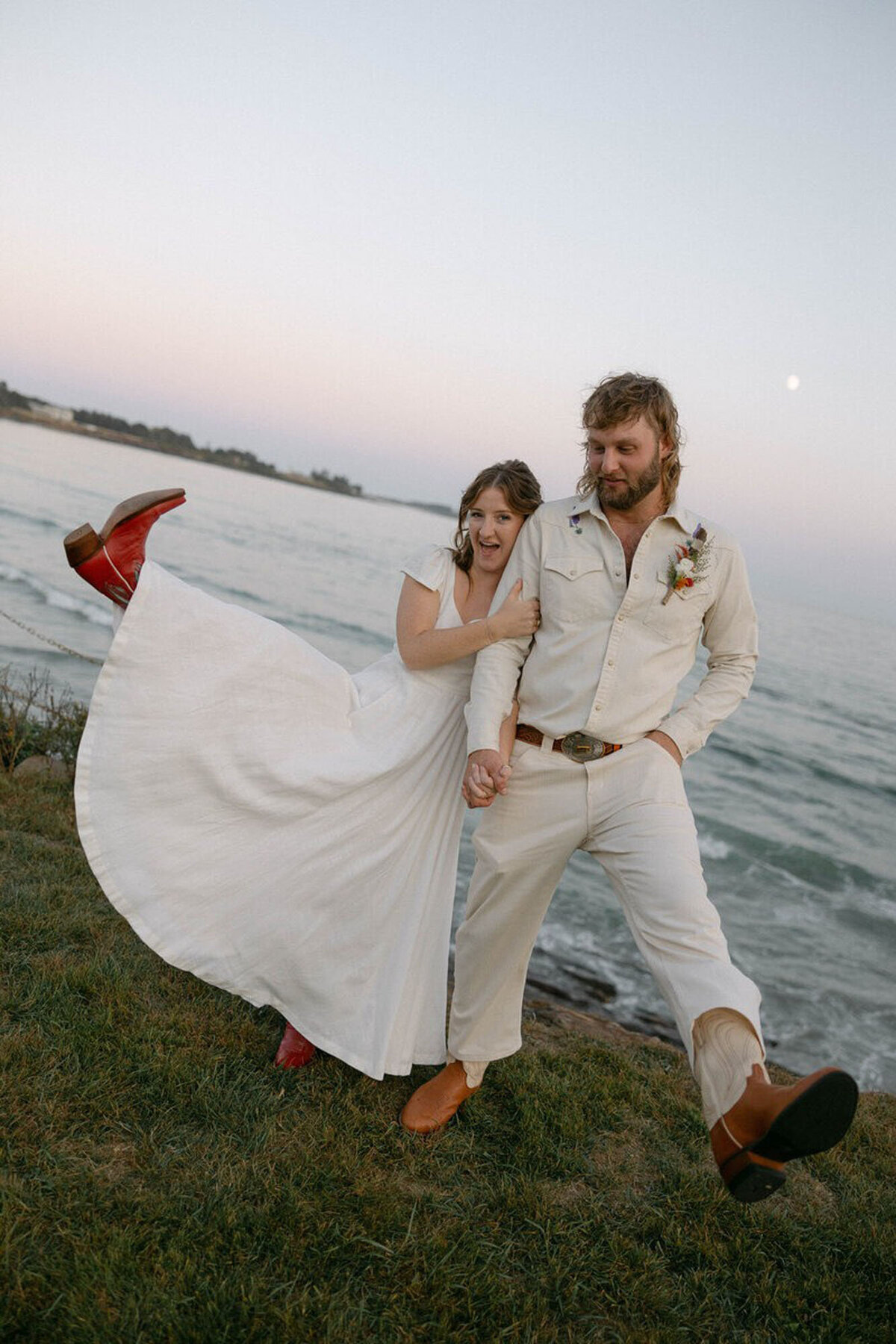 Bride and groom next to lake, taken by photographers in orlando fl