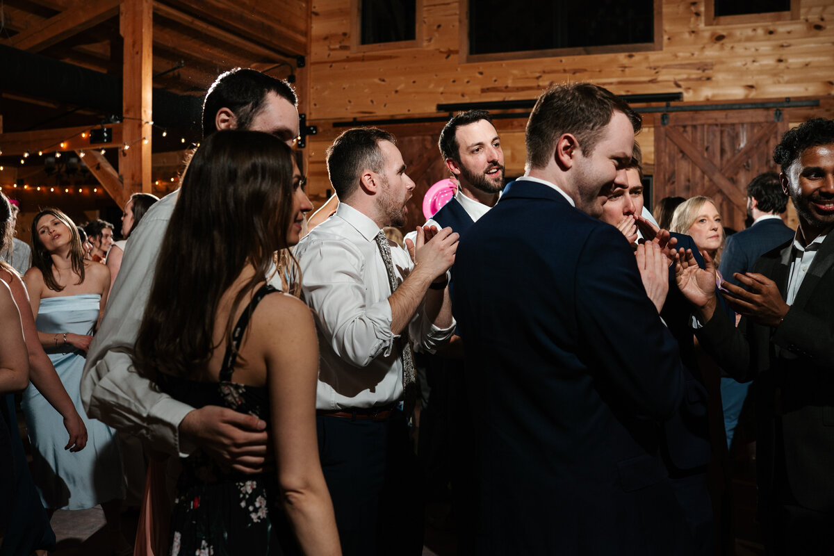Reception decor featuring rustic charm and romantic candlelight
