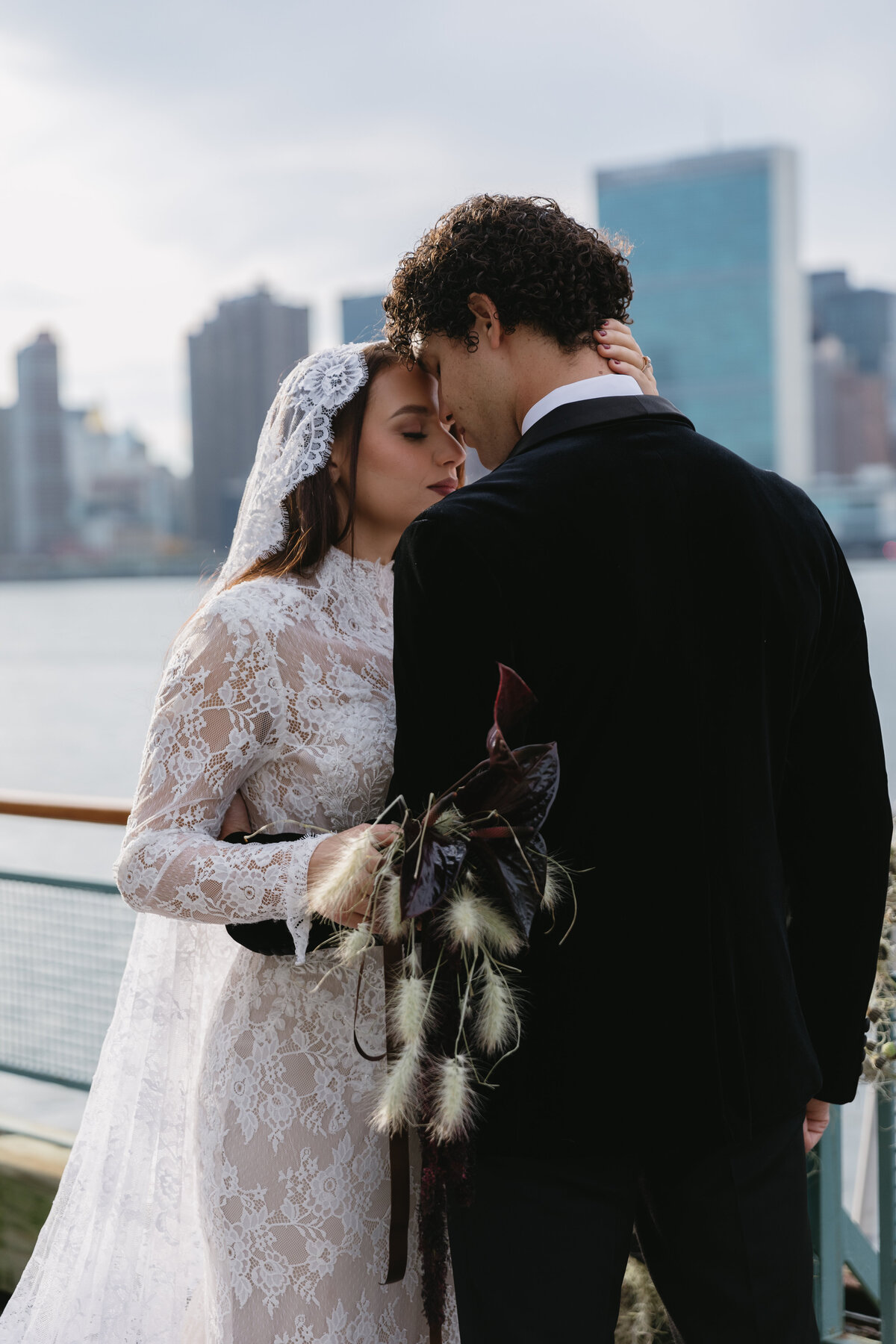 meredith-michel-editorial-wedding-couple-forehead-touch-manhattan-view