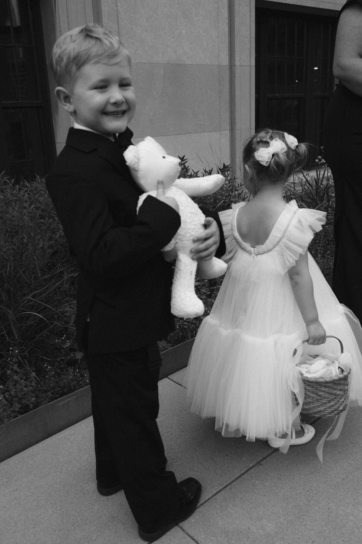 Film photography captures editorial ceremony moments at Old Post Office Chicago with Lauren Alatriste's fashion forward approach, showcasing architectural beauty while maintaining sophisticated luxury wedding imagery and authentic emotional storytelling.