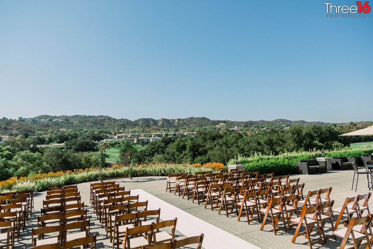 Chairs setup for a wedding overlooking the golf course ravine at Coto de Caza Golf & Racquet Club