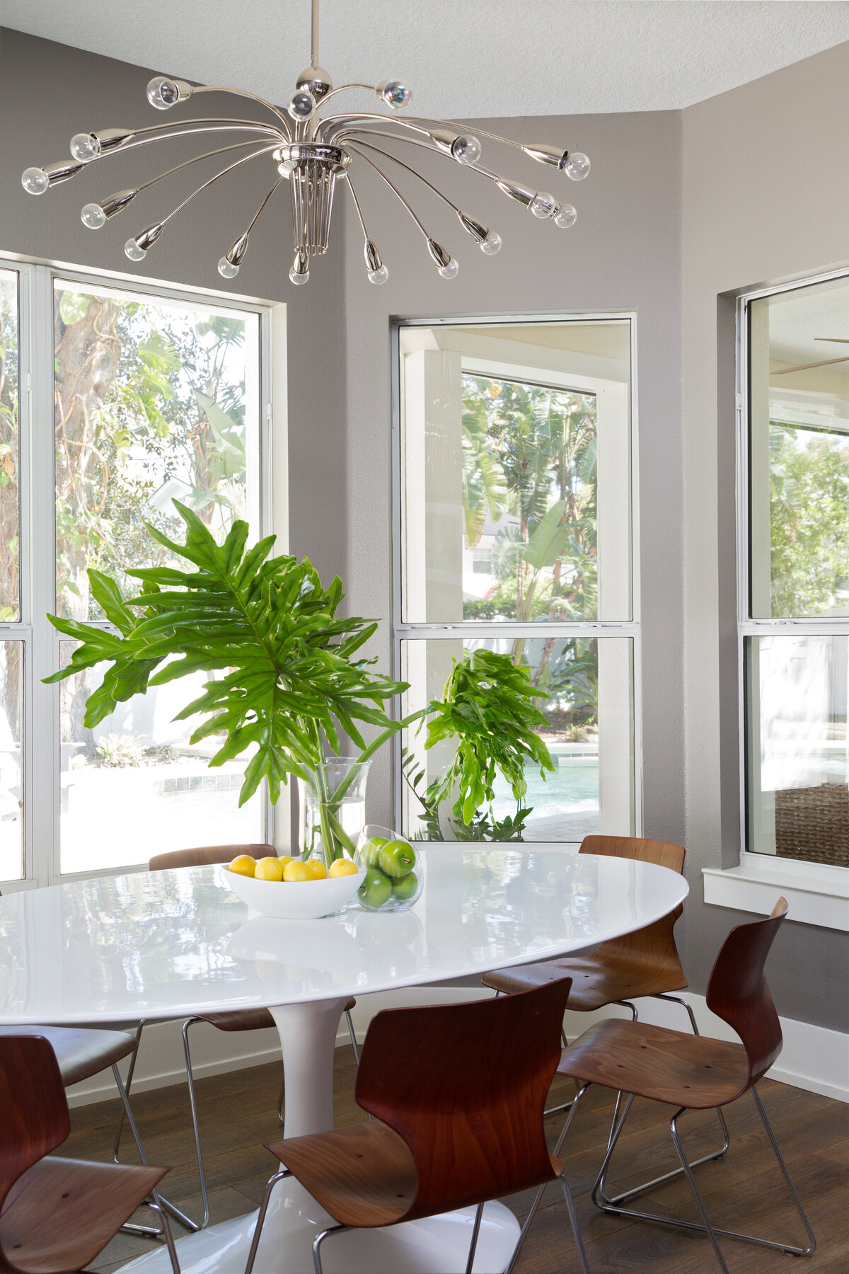 Minimal Design Round White Dining Table with Brown Naked Design Chair