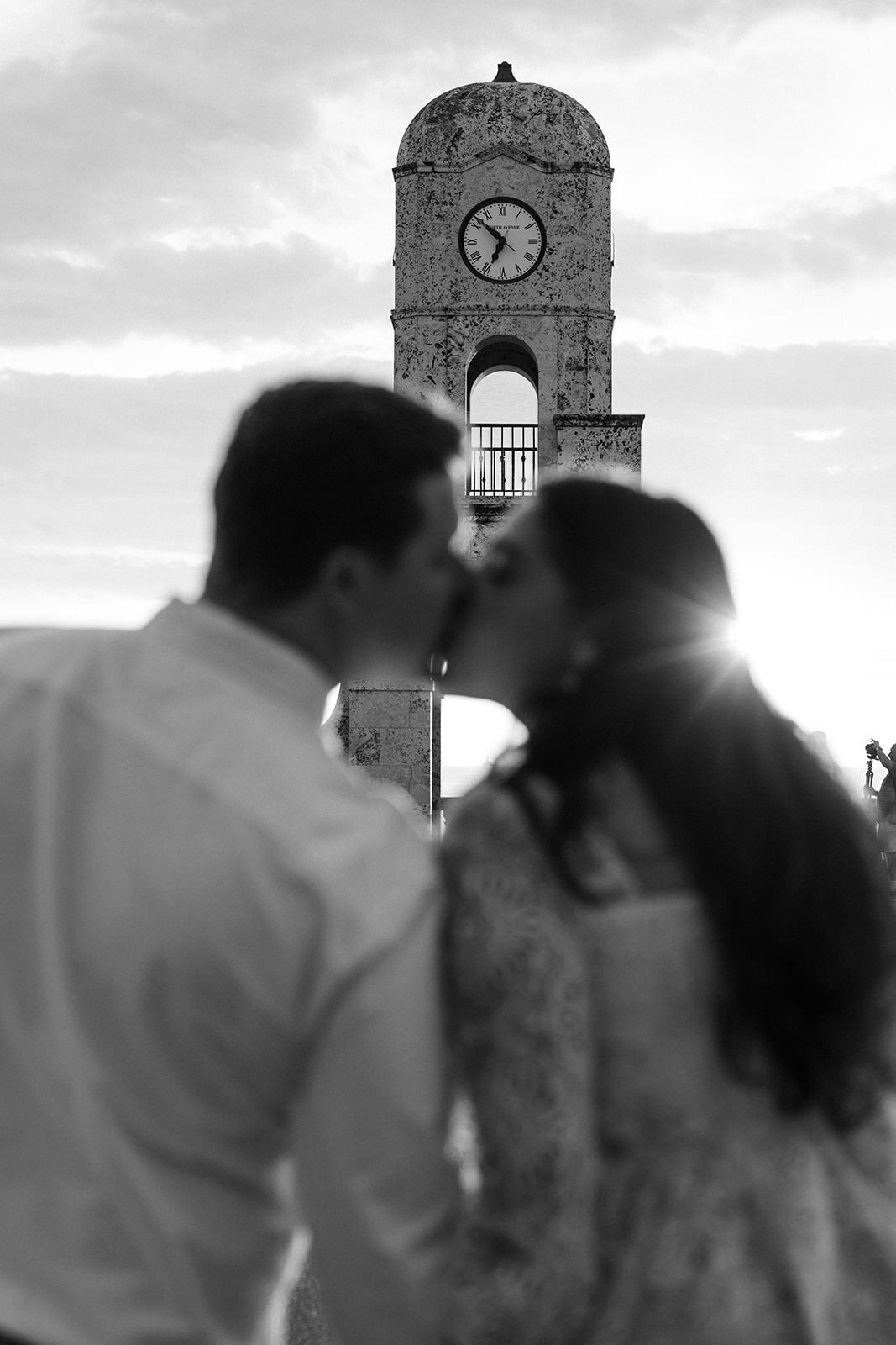 couple-kissing-clock-tower-2NA-E