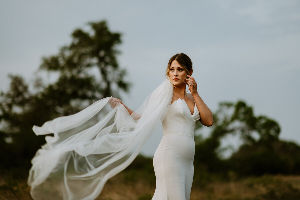 bride holding veil