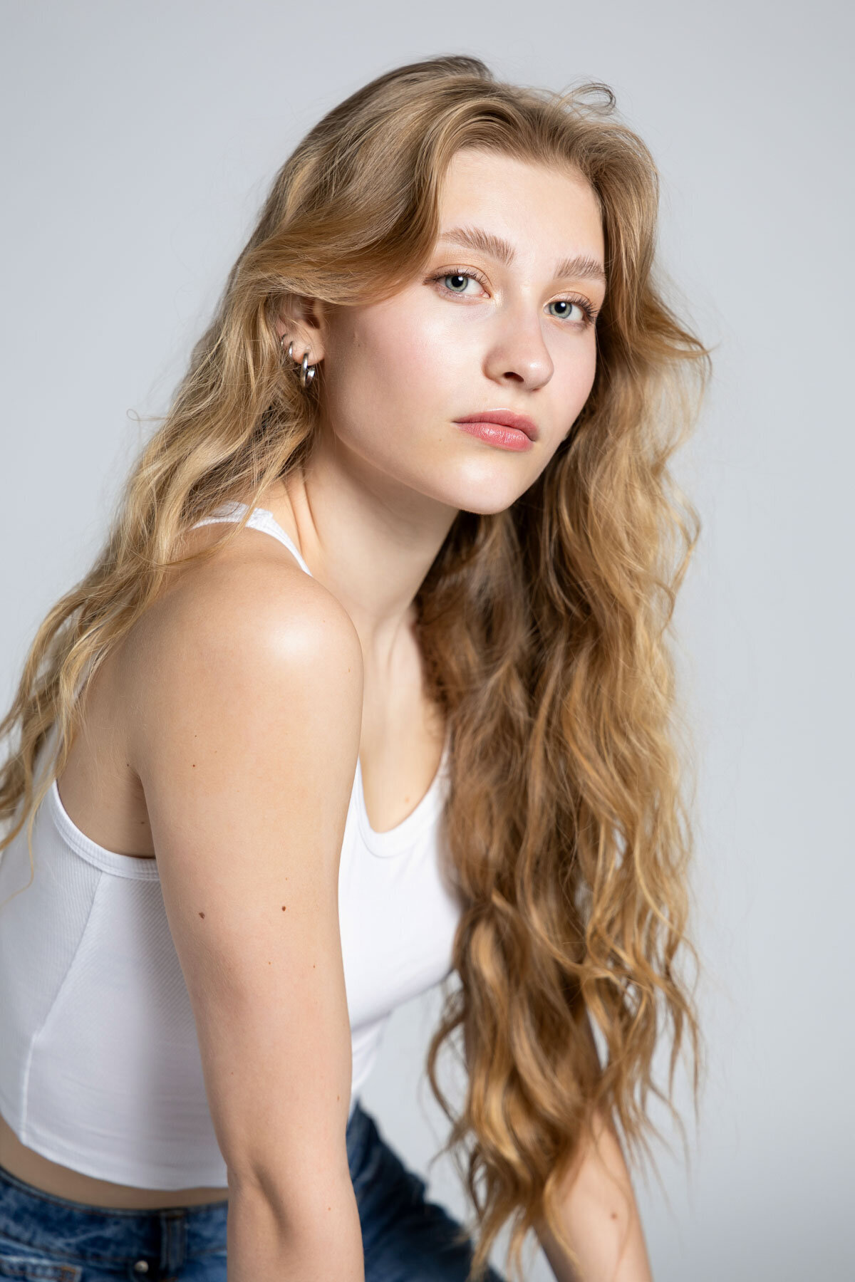 White background senior portrait taken in Salt Lake City Utah.