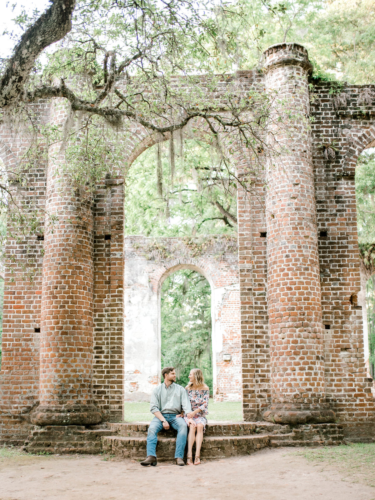 Brick wall oak trees