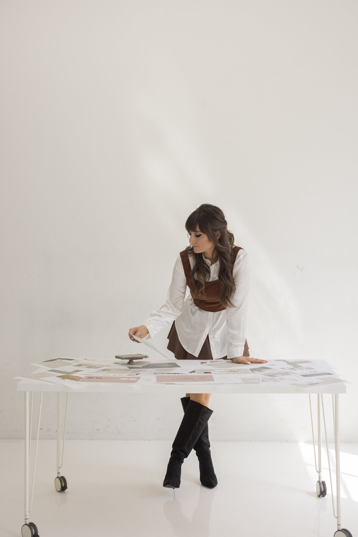 Tracy, founder of The Fully Alive Agency, working on brand strategy and creative direction for entrepreneurs