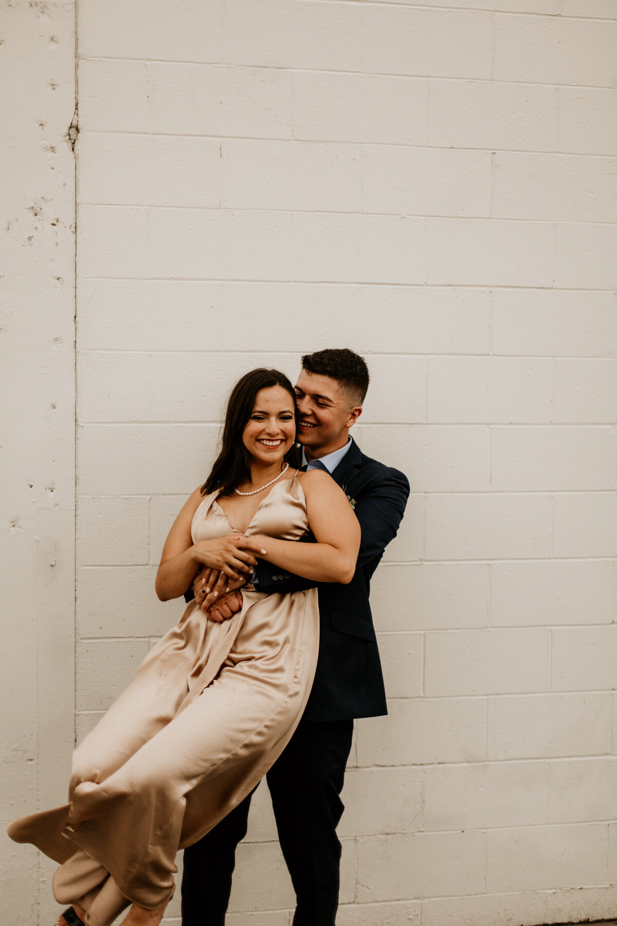 groom picking up new wife in downtown Albuquerque