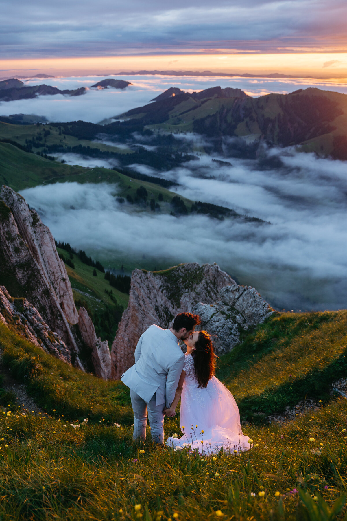 Amazing mountain view at sunset with eloping couple in Switzerland