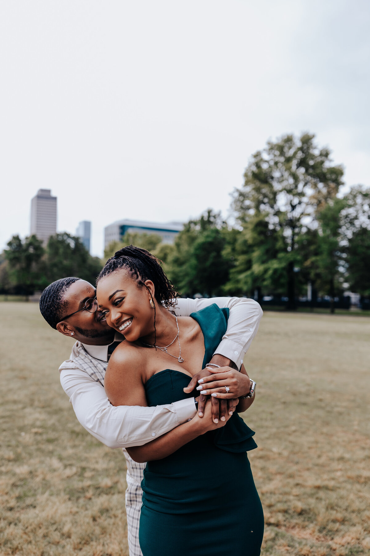 Nashville engagement photographer captures couple hugging during outdoor engagement session