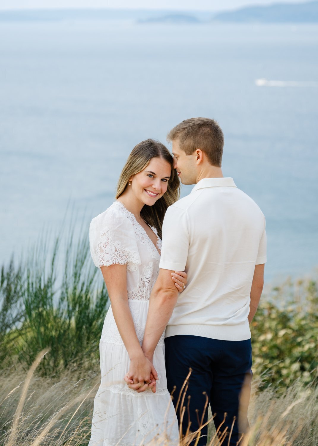 pnw couple engagement portrait at discovery park in sun