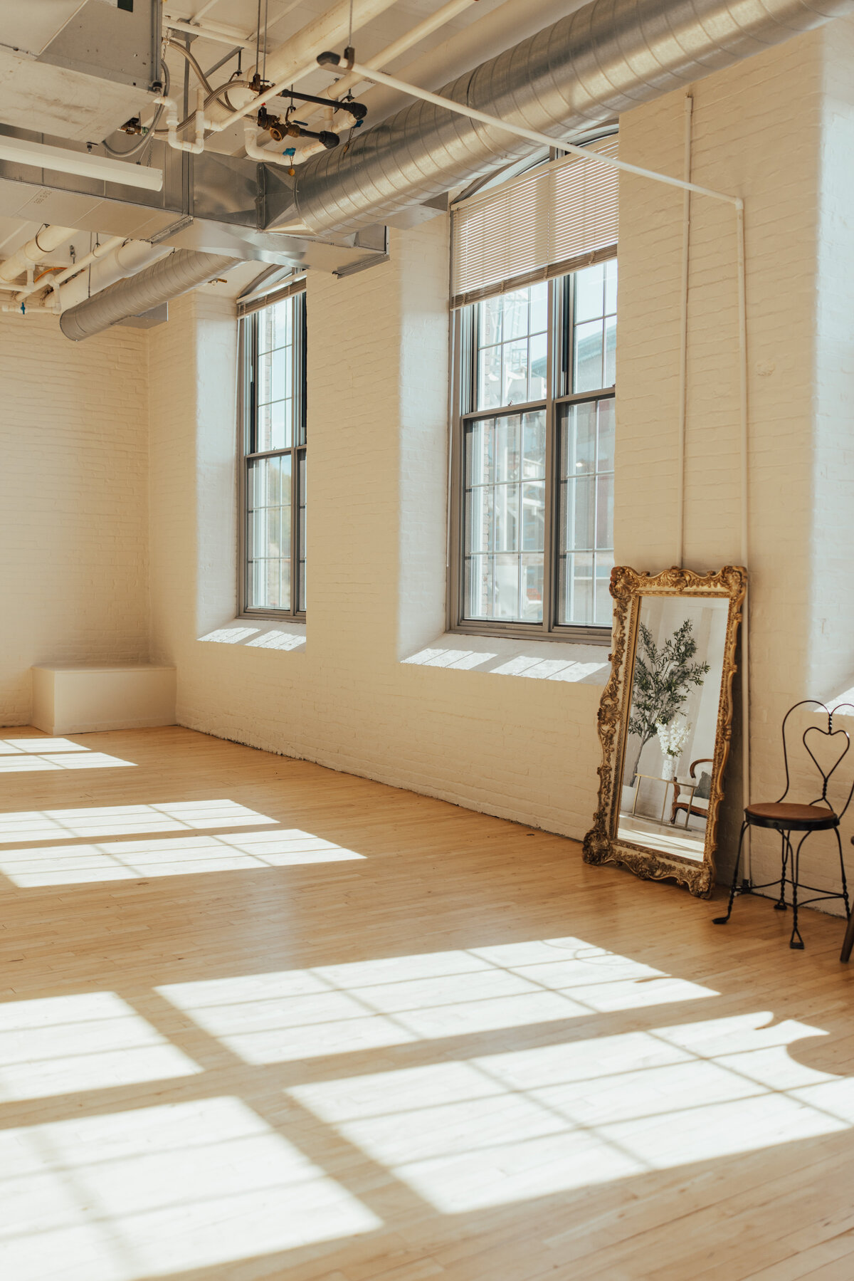 Gilded mirror at The Archer Atelier a Maine creative studio for photographers and artists