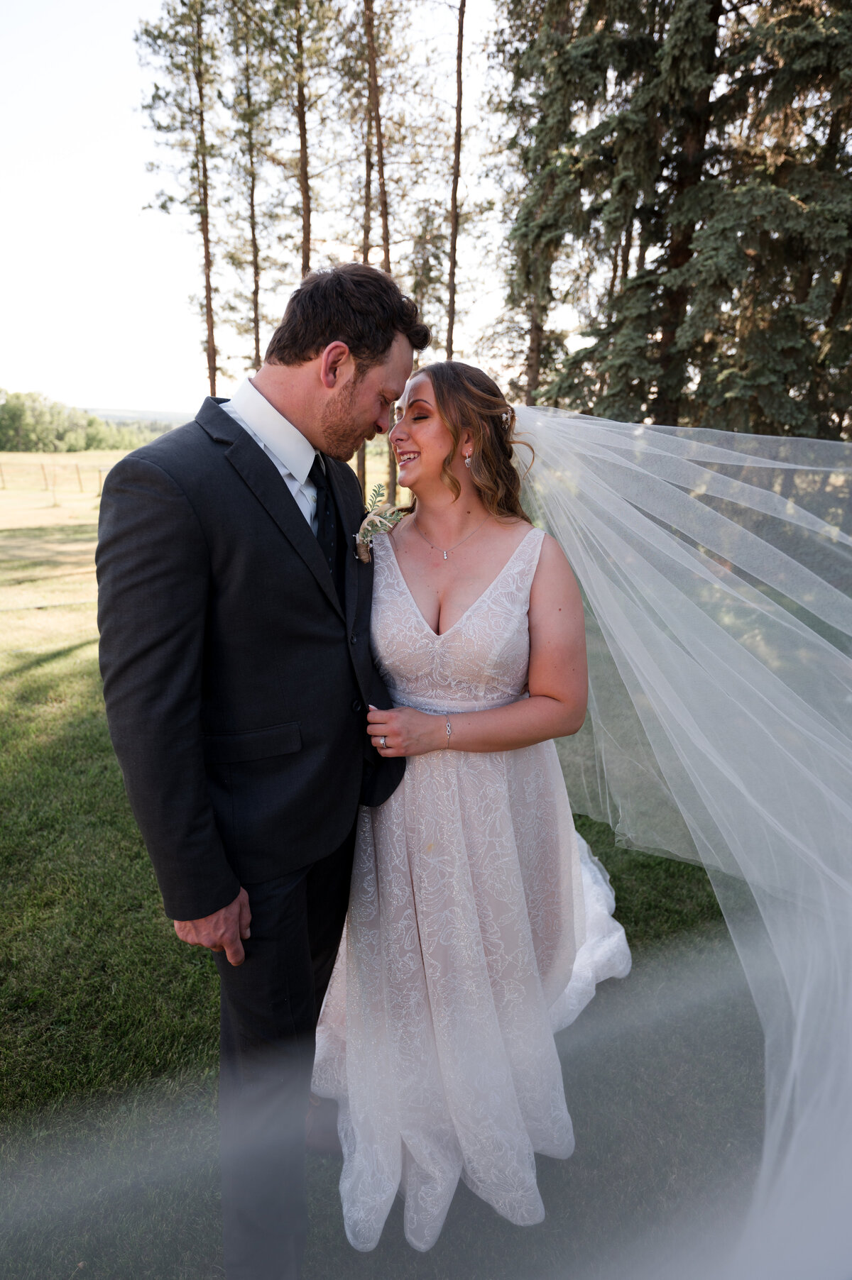 wedding couple pose for photos