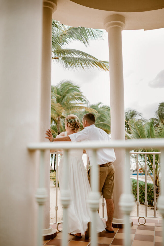 candid-beach-wedding-couple-gazebo-RIU-palace-riviera-maya-playa-del-carmen-mexico-storyteller-collective-photo-co