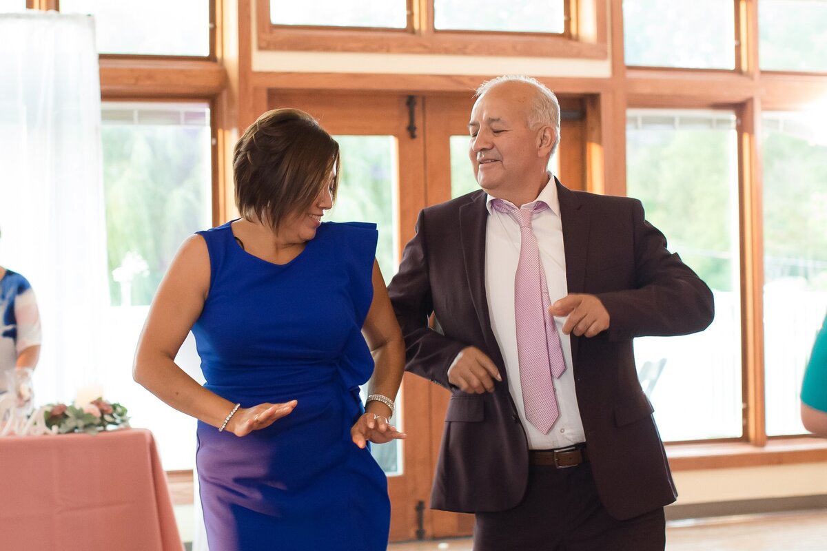 CCynthia and Marco sharing a special moment at their Chicago wedding, beautifully planned by SouthWind Events