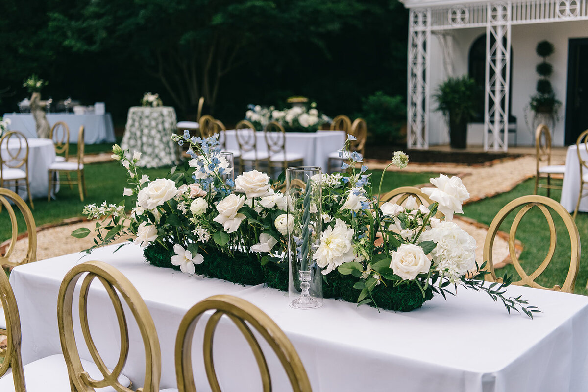 White and blue floral centerpieces designed by Abby Grace Florals at Greenville SC wedding