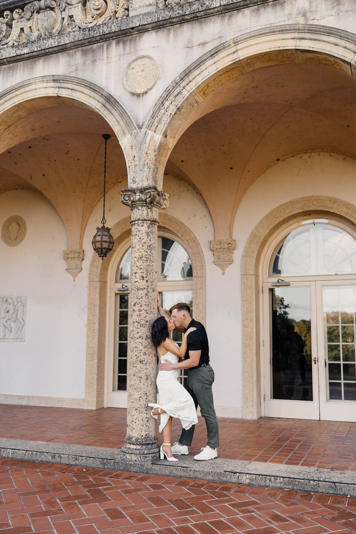 Couple sharing a quiet, romantic moment in the stunning gardens of The Philbrook Museum of Art, Tulsa, Oklahoma.