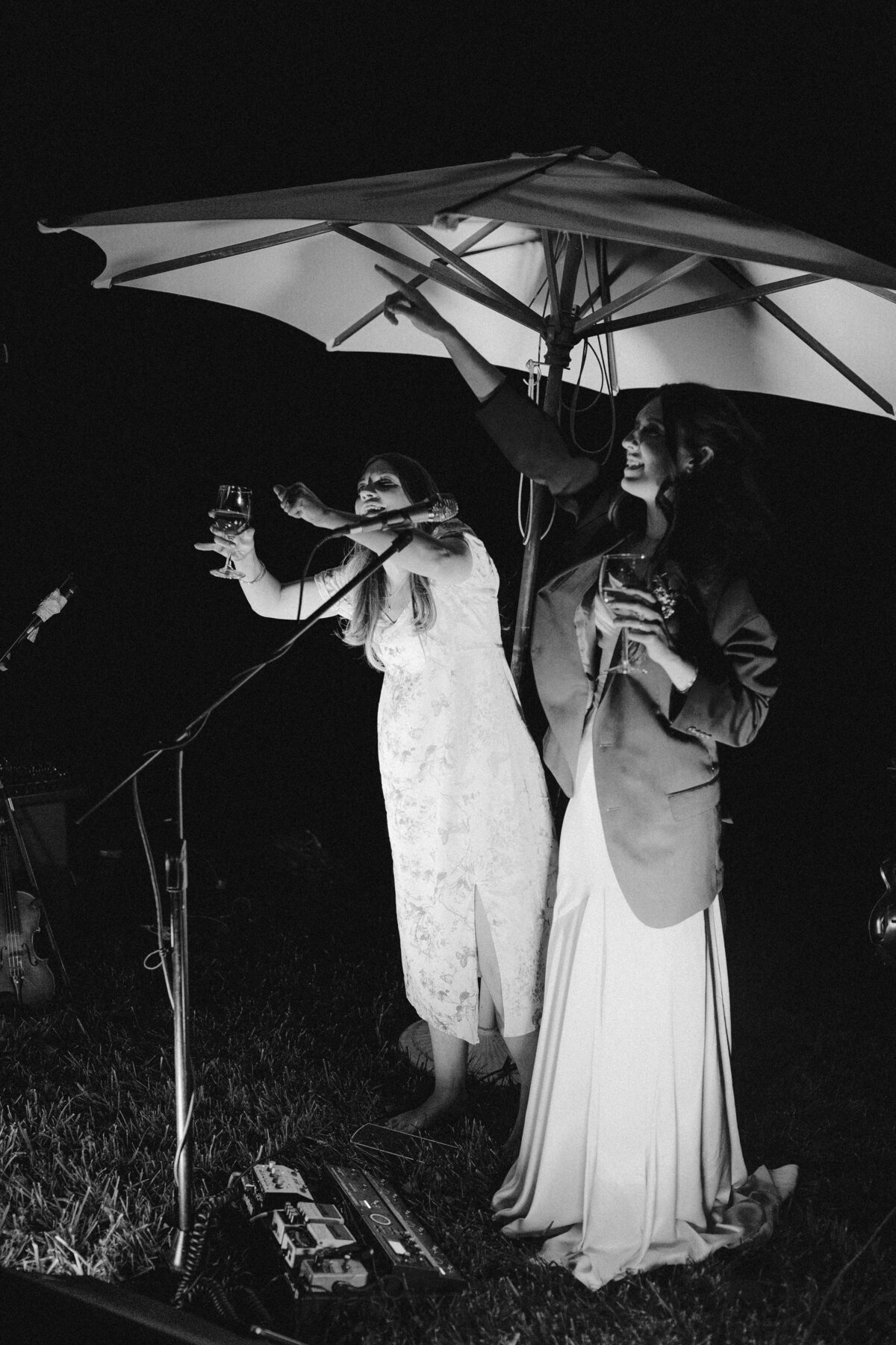 Wedding guests singing at Dallenbach Ranch Wedding in Colorado