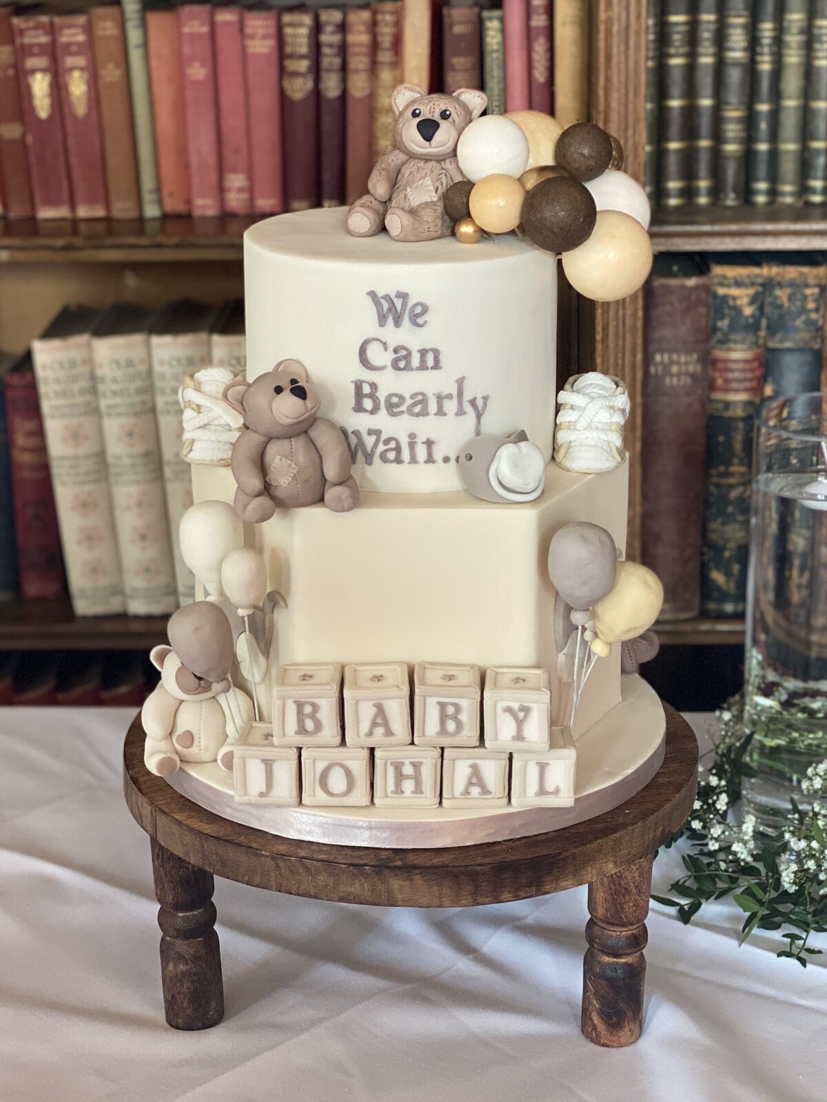 Ivory baby shower cake with hand made teddies