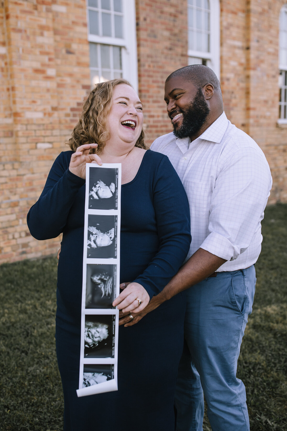 Maternity photo announcement with an ultrasound. 