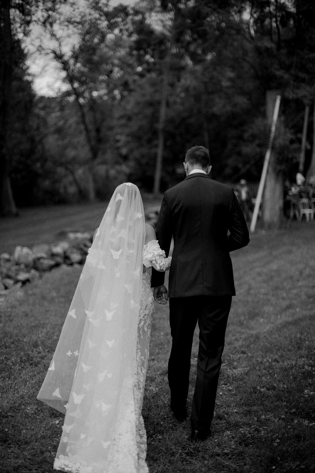 Bride and groom walking down the aisle for their outdoor wedding near Madison Wisconsin