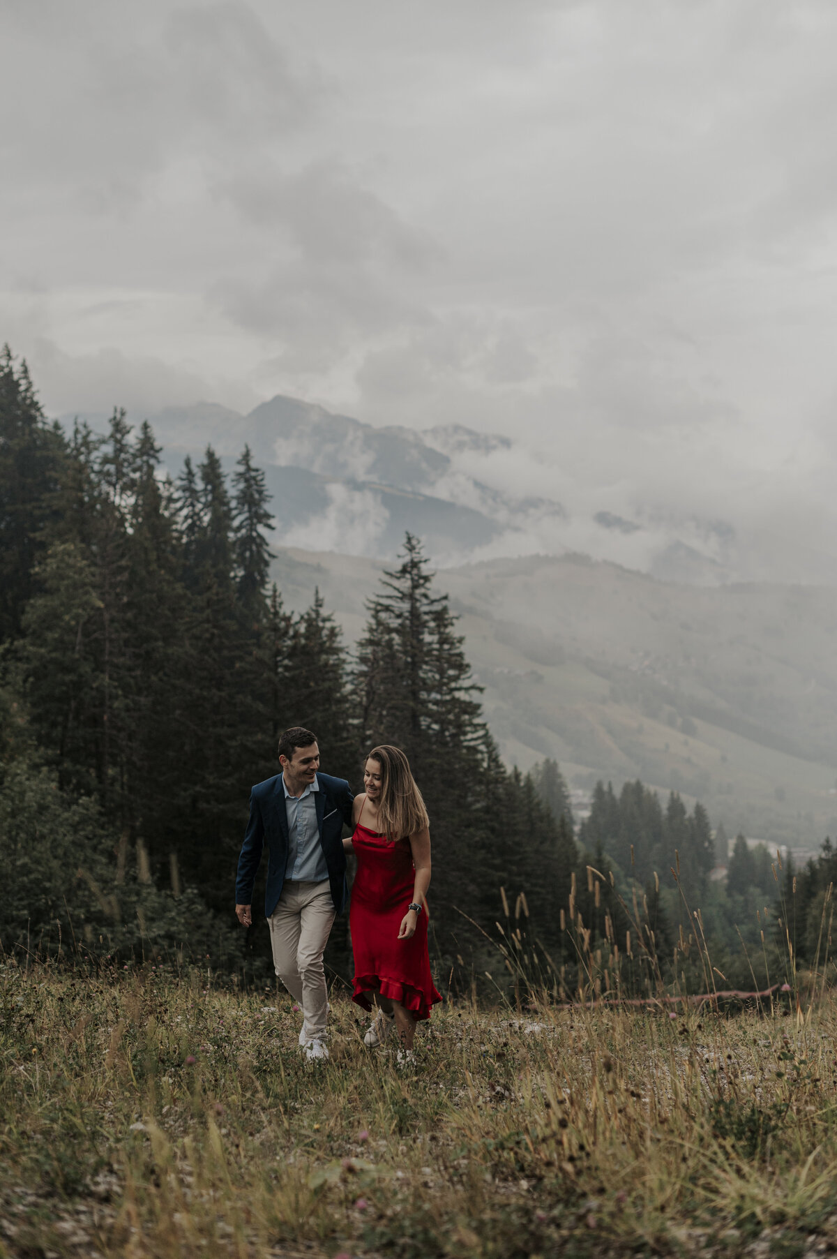 Couple walking in the mountains of the French Alps