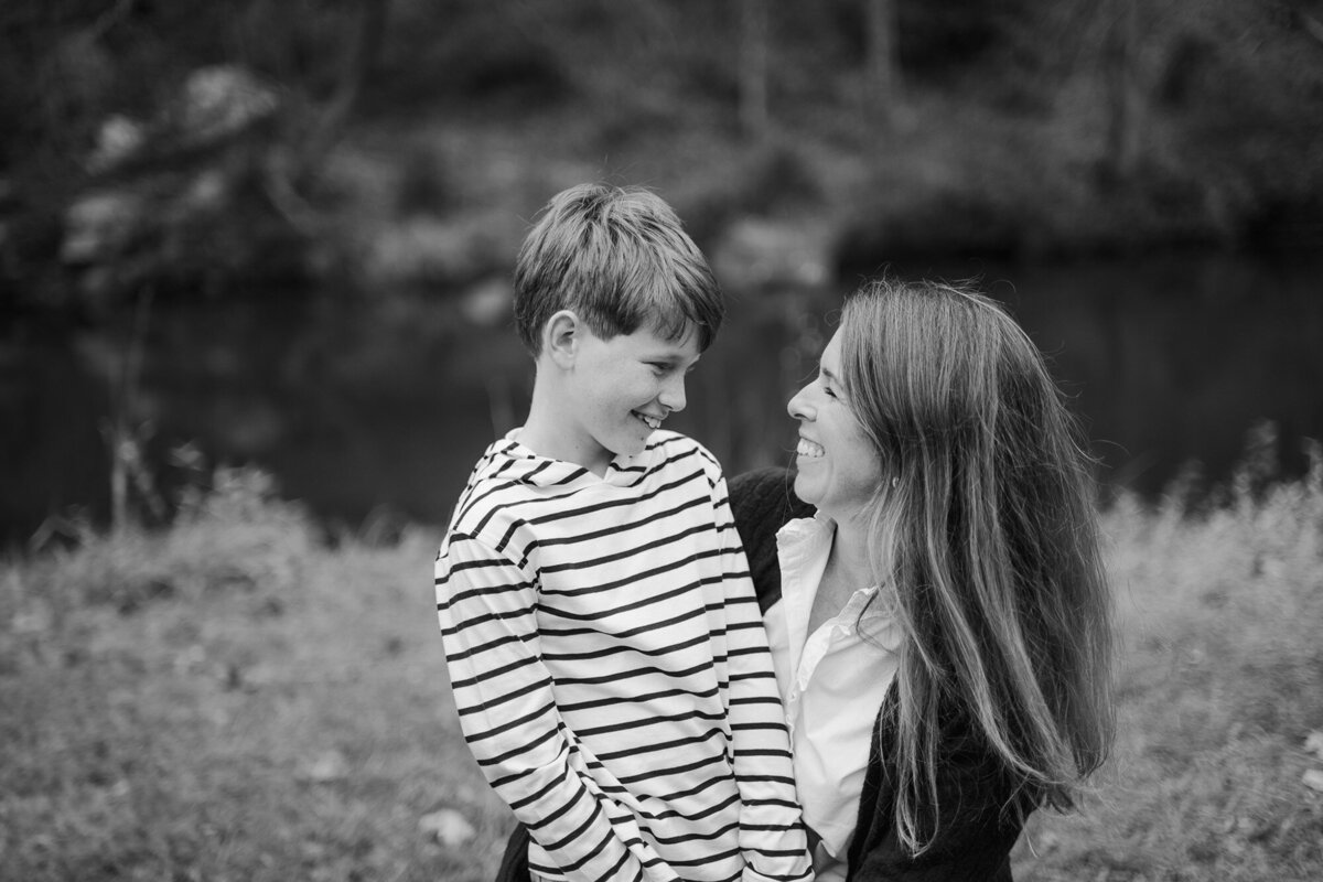Mother and son smiling at each other 