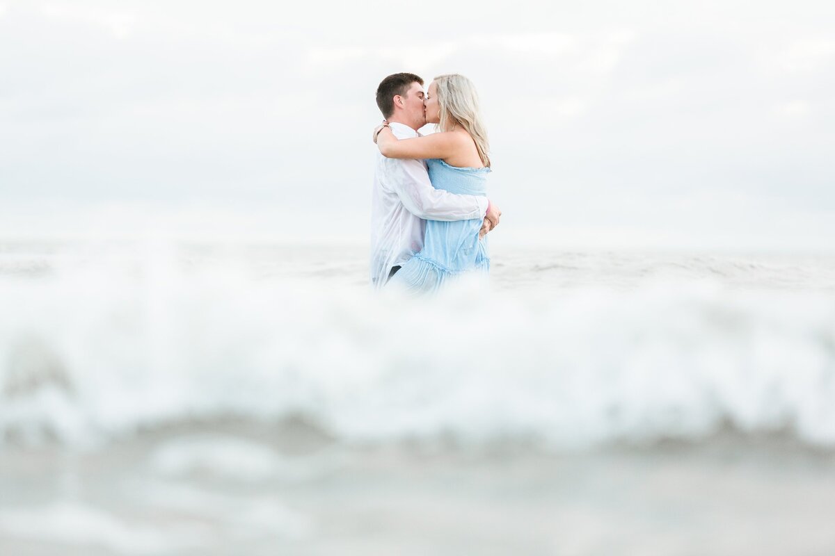 Young couple go out into the ocean
