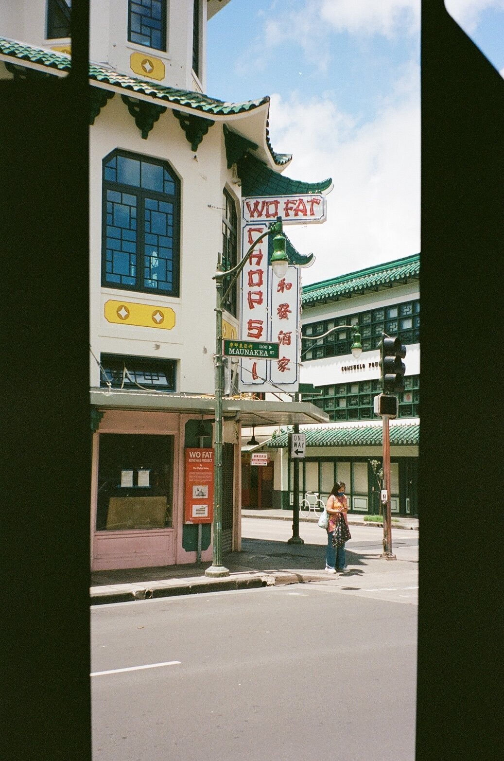 Chinatown architecture captured on analog film by Kate Winters Photography, showcasing the vibrant, historic details in an authentic, documentary style.