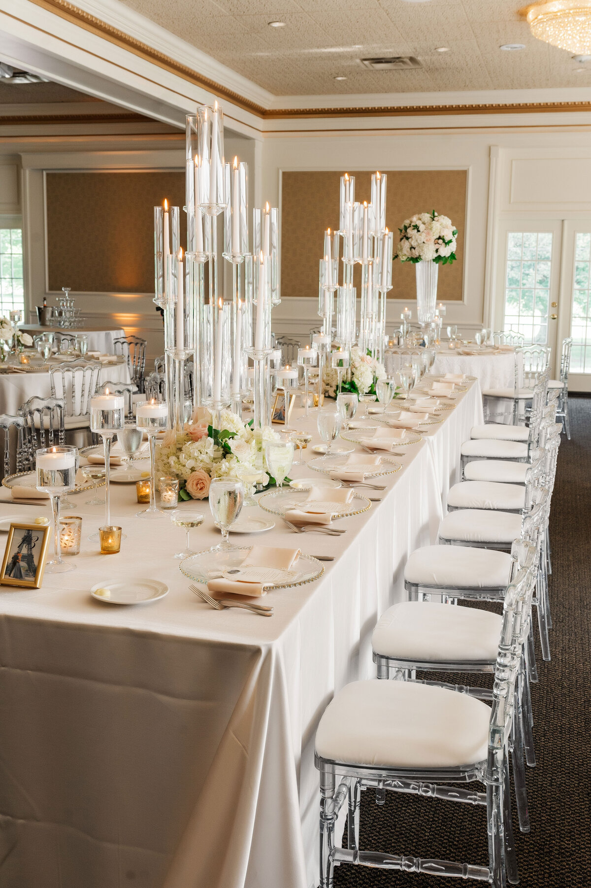 wedding reception table setup in the ballroom at The Grand Resort