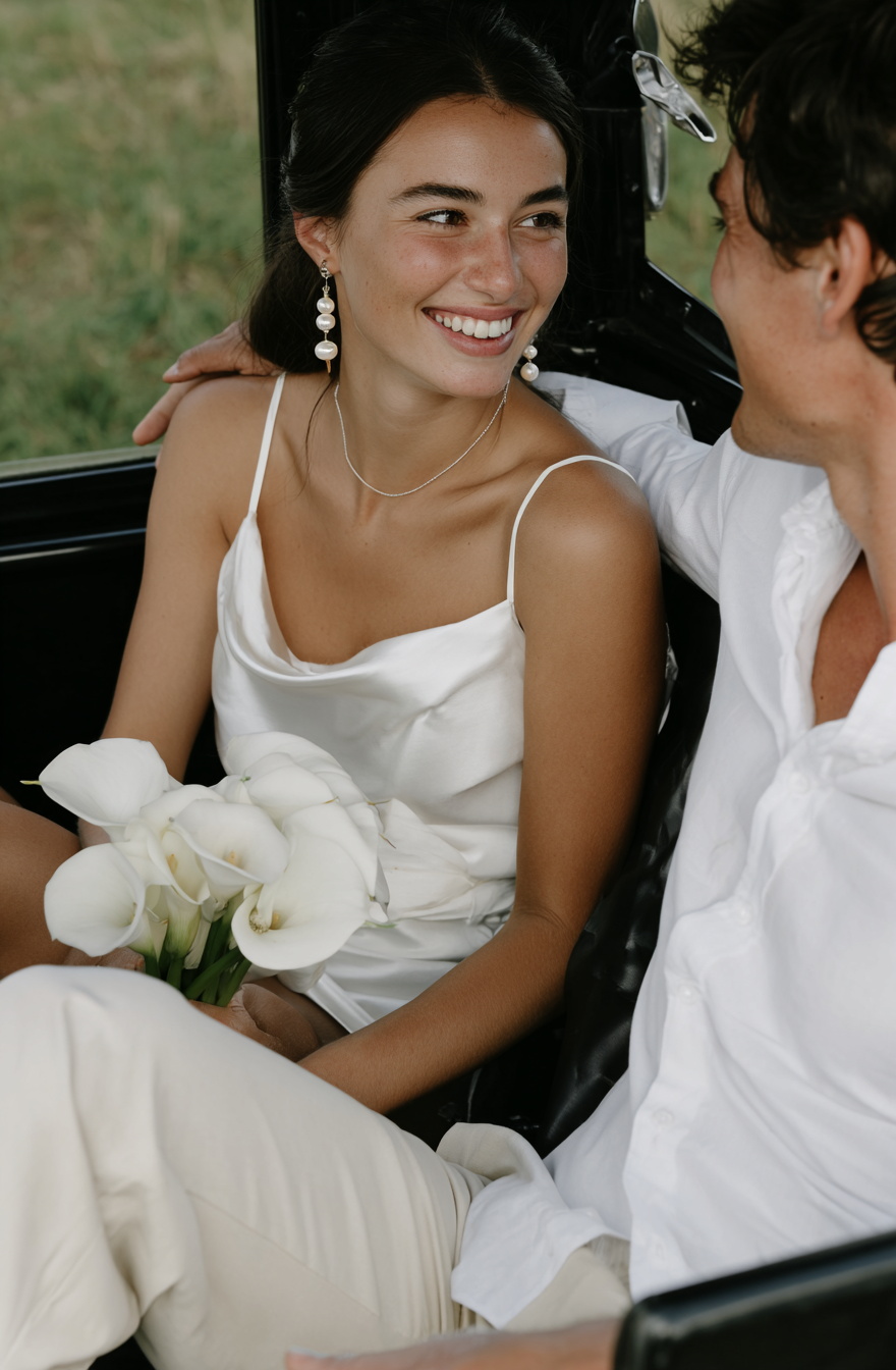 u8487914977_photograph_of_the_happy_bride_and_groom_sitting_i_403ee678-f212-4fdb-ae6c-0305de9a0fd2_3