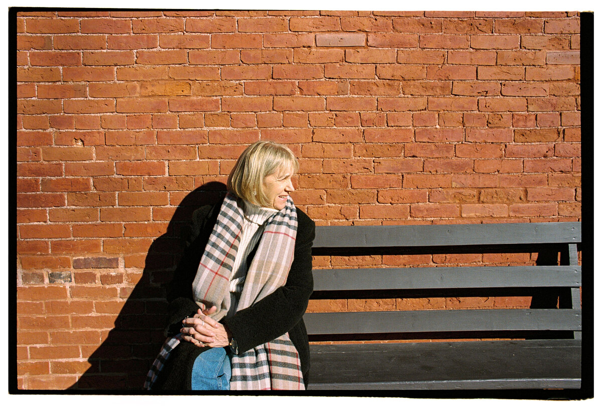 Emotional portrait of a woman captured on film by Kate Winters Photography, showcasing a raw and authentic moment in Carmel, California.