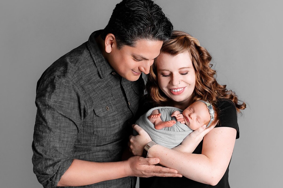 Vancouver studio newborn session with mother, father and baby girl