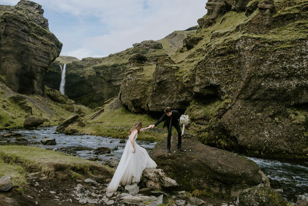 eloping couple at waterfall