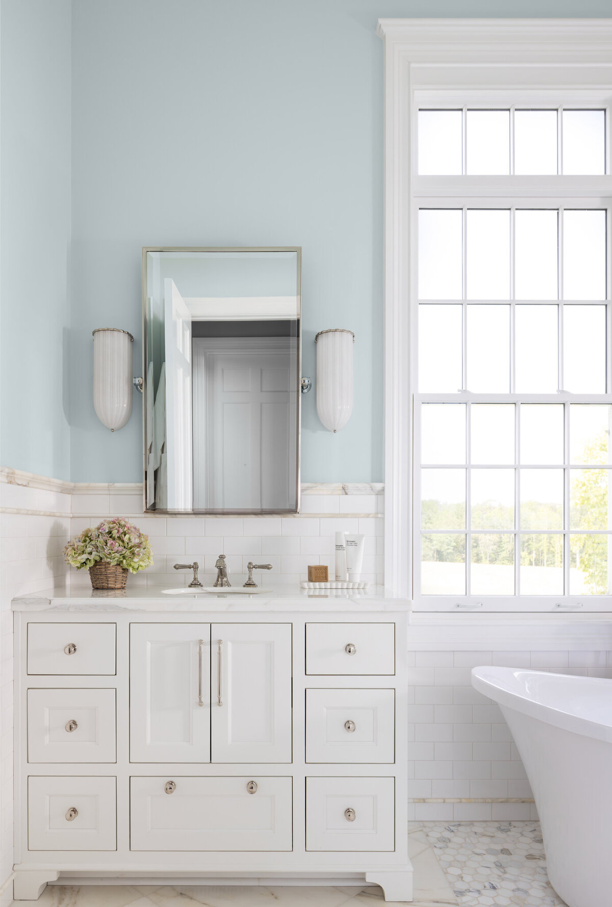 Primary_bath_vanity_next_to_large_window