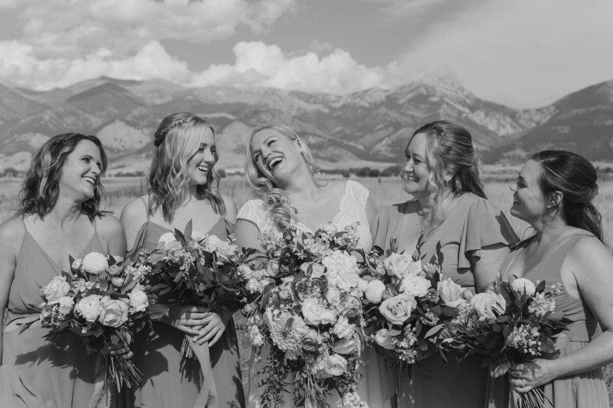Outdoor portrait of bride with bridesmaids