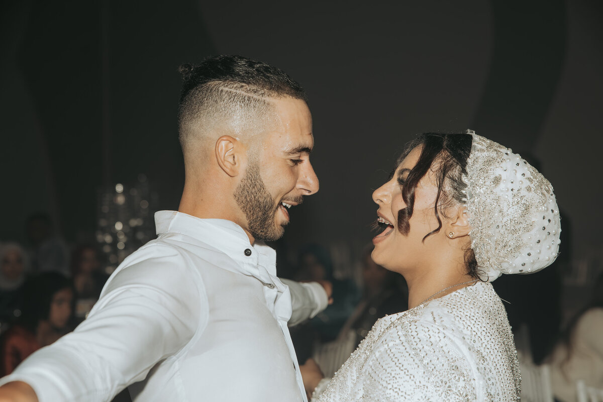 Bride and Groom Laughing During First Dance – Los Angeles Arabic Wedding