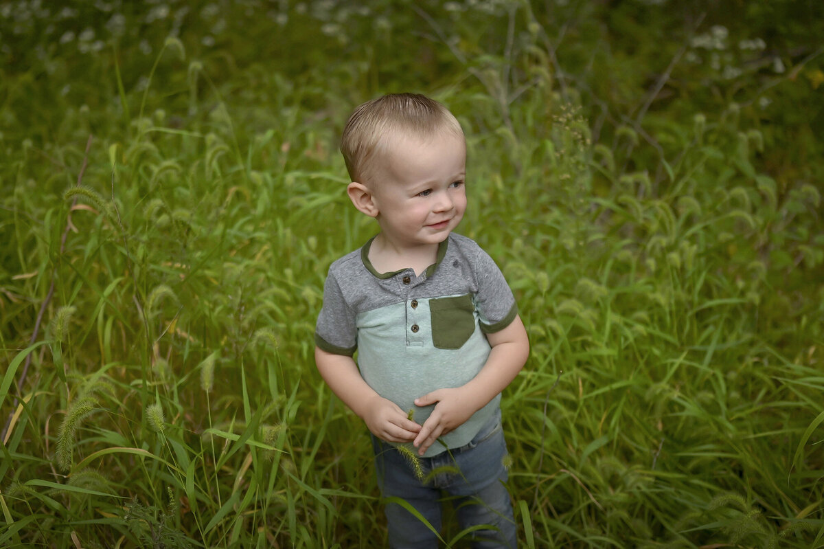 A candid shot caught by a Pella Family Photographer of a little boy